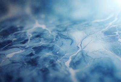 The primary subject of the image is a blue and white ocean scene. The setting is a blue and white ocean surface, with a blue background. The visual style is a digital art or illustration, creating a vibrant and dynamic atmosphere. The dominant colors are blue and white, which contribute to the overall mood of the image.