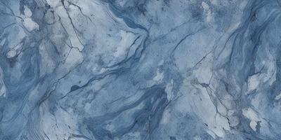 The primary subject of the image is a blue marble tile with a pattern of white and blue swirls. The setting is a bathroom, as indicated by the presence of the marble tile. The visual style is a close-up of the tile, showcasing its intricate design. The colors and mood of the image are predominantly blue and white, creating a calm and serene atmosphere.