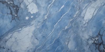 The primary subject of the image is a blue marble tile with a pattern of white and blue swirls. The setting is a bathroom, as indicated by the presence of the marble tile. The visual style is a close-up of the tile, showcasing its intricate design. The dominant colors are blue and white, creating a calm and soothing atmosphere.