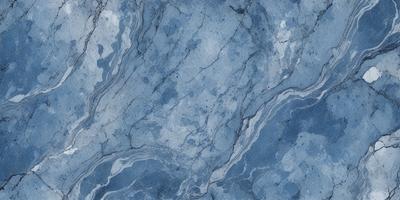 The primary subject of the image is a blue marble surface with a pattern of white and blue swirls. The setting is a blue marble countertop, and the visual style is a close-up of the marble surface. The colors and mood of the image are predominantly blue, with the white and blue swirls adding a touch of contrast and visual interest.