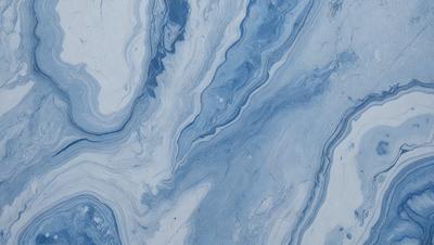 The primary subject of the image is a blue and white marbled tile. The setting is a bathroom, as indicated by the presence of the marbled tile. The visual style is a close-up of the tile, showcasing its intricate design. The dominant colors are blue and white, creating a calm and soothing atmosphere.