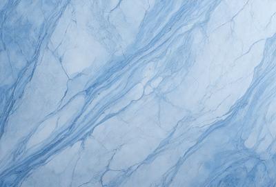 The primary subject of the image is a blue marble wall with a pattern of swirls and waves. The setting is a bathroom, and the visual style is a photo. The dominant colors are blue and white, creating a calm and soothing atmosphere.