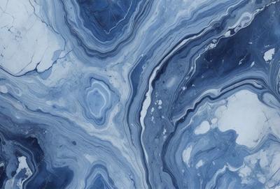 The primary subject of the image is a close-up of a blue and white marbled stone. The setting is a rocky surface, and the visual style appears to be a photo of the stone. The dominant colors are blue and white, creating a calm and serene atmosphere.