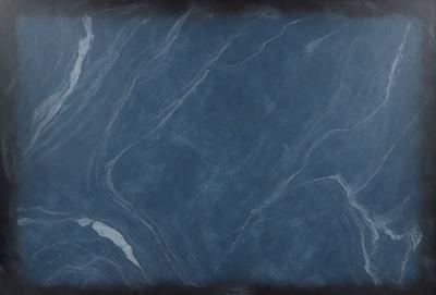 The primary subject of the image is a blue marble wall. The setting is a dark room, and the visual style appears to be a photo. The dominant colors are blue and black, creating a moody atmosphere.