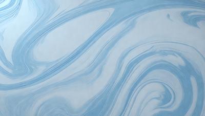 The primary subject of the image is a blue and white painting of waves. The setting is a white wall, and the visual style appears to be a digital art or illustration. The dominant colors are blue and white, creating a calming and serene atmosphere.
