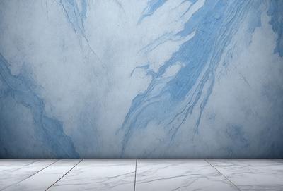 The primary subject of the image is a marble tile floor with a blue and white marble pattern. The setting is a room with a blue and white marble wall, which complements the floor. The visual style is a photo of the floor and wall, showcasing the beautiful marble pattern. The colors and mood of the image are predominantly blue and white, creating a clean and elegant atmosphere.