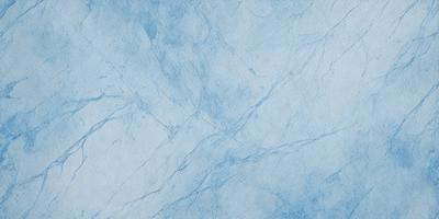 The primary subject of the image is a blue marble wall with a white background. The visual style is a photo, and the colors and mood are predominantly blue and white, creating a clean and serene atmosphere.