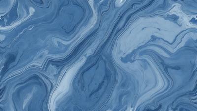 The primary subject of the image is a blue and white marbled surface, which appears to be a piece of art or a decorative item. The setting is a room with a blue wall, and the visual style is a close-up of the marbled surface. The colors and mood of the image are predominantly blue and white, creating a calm and serene atmosphere.