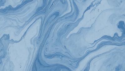 The primary subject of the image is a blue and white marbled surface, which appears to be a wall or a piece of art. The setting is a room with a blue and white marbled wall, and the visual style is a close-up of the marbled surface. The colors and mood of the image are predominantly blue and white, creating a calm and serene atmosphere.