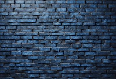 The primary subject of the image is a blue brick wall. The setting is a brick wall, and the visual style is a photo. The dominant colors are blue and grey, creating a calm and serene atmosphere.