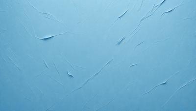 The primary subject of the image is a blue wall with a textured surface. The setting is a room with a blue background. The visual style is a close-up of the blue wall, which gives a sense of depth and texture. The dominant colors are blue and white, creating a calm and soothing atmosphere.