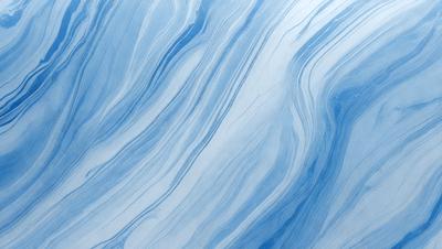 The primary subject of the image is a blue and white ocean wave. The setting is the ocean, with the wave rolling in. The visual style is a photo of the ocean, capturing the beauty of the waves. The dominant colors are blue and white, creating a serene and calming atmosphere.