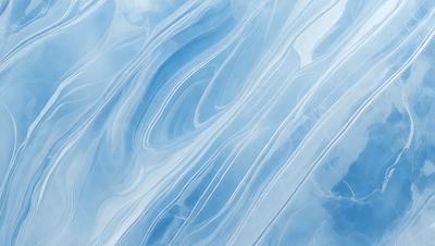 The primary subject of the image is a blue and white ocean wave. The setting is the ocean, with the wave being the main focus of the image. The visual style is a photo of the ocean, capturing the beauty of the wave. The dominant colors are blue and white, creating a serene and calming atmosphere.