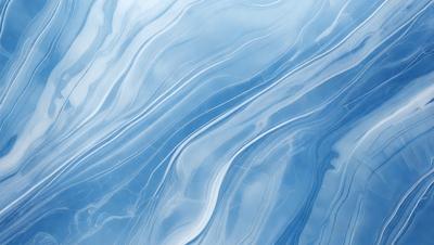The primary subject of the image is a blue ocean with waves. The setting is the ocean, and the visual style is a photo. The dominant colors are blue and white, creating a calm and serene atmosphere.