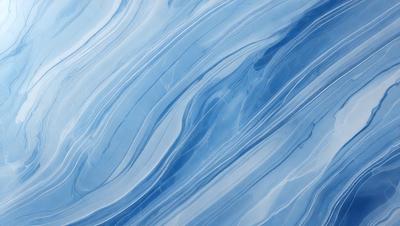 The primary subject of the image is a blue ocean with waves. The setting is the ocean, and the visual style is a photo. The dominant colors are blue and white, creating a serene and calming atmosphere.