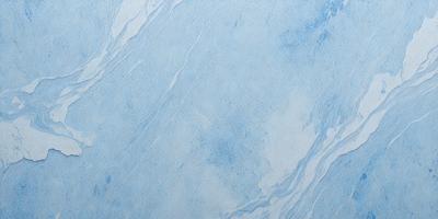 The primary subject of the image is a blue and white marbled wall. The setting is a room with a blue and white marbled wall as the main focus. The visual style is a photo of the marbled wall. The dominant colors are blue and white, creating a calm and soothing atmosphere.