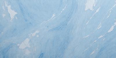 The primary subject of the image is a blue and white marble-like surface, which appears to be a wall or a countertop. The setting is a room with a blue and white color scheme, giving the space a modern and elegant feel. The visual style of the image is a close-up of the marble surface, showcasing its intricate patterns and textures. The dominant colors in the image are blue and white, creating a serene and calming atmosphere.