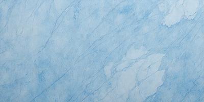 The primary subject of the image is a blue marble wall with a pattern of white lines. The setting is a room with a blue marble wall, and the visual style is a photo. The dominant colors are blue and white, creating a calm and serene atmosphere.