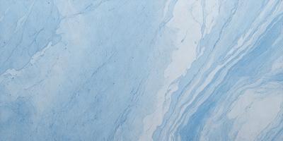 The primary subject of the image is a blue marble tile. The setting is a white wall, and the visual style is a close-up of the tile. The dominant colors are blue and white, creating a calm and serene atmosphere.