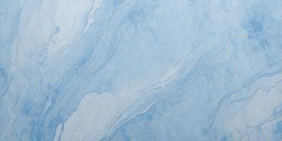 The primary subject of the image is a blue and white marbled tile. The setting is a bathroom, as the tile is placed on a wall. The visual style is a photo, capturing the intricate patterns and textures of the marbled tile. The dominant colors are blue and white, creating a calm and soothing atmosphere in the bathroom.
