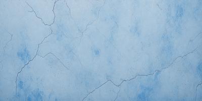 The primary subject of the image is a blue wall with a cracked and chipped appearance. The setting is a room with a blue background. The visual style is a close-up of the wall, showcasing its texture and imperfections. The colors and mood of the image are predominantly blue, giving it a calm and serene atmosphere.