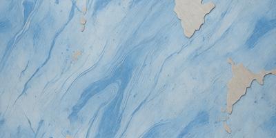 The primary subject of the image is a blue and white marbled surface, which appears to be a piece of marble or a marbled wall. The setting is a room with a blue and white marbled wall, and the visual style is a close-up of the marbled surface. The colors and mood of the image are predominantly blue and white, creating a calm and serene atmosphere.