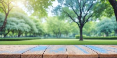 The primary subject of the image is a wooden bench situated in a park. The bench is placed on a grassy field, surrounded by trees. The setting is a serene, natural environment, perfect for relaxation and enjoying the outdoors. The visual style of the image is a photo, capturing the beauty of the park and the wooden bench. The colors and mood of the image are predominantly green and calm, reflecting the peaceful atmosphere of the park.