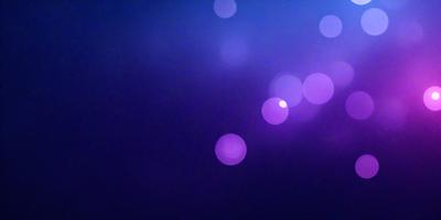 The primary subject of the image is a purple background with a pattern of purple lights. The setting is a dark room, and the visual style appears to be a digital art or illustration. The dominant colors are purple, and the overall atmosphere is a mix of artistic and mysterious.