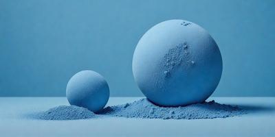 The primary subject of the image is a blue sphere, which is the main object, scene, or focus of the image. The setting or background is a blue surface, which adds to the overall atmosphere of the image. The visual style of the image is a photo, as it captures the blue sphere in its natural environment. The colors and mood of the image are predominantly blue, creating a calm and serene atmosphere.