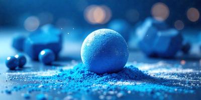 The primary subject of the image is a blue ball, which is the main object in the scene. The setting is a blue background, which creates a visually appealing contrast with the blue ball. The visual style of the image is a photo, capturing the details of the blue ball. The colors and mood of the image are predominantly blue, giving it a calm and serene atmosphere.