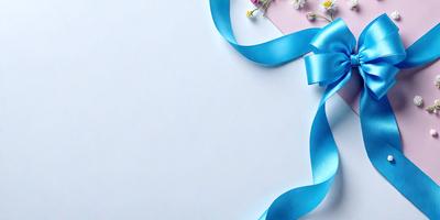 The primary subject of the image is a blue ribbon with white flowers attached to it. The ribbon is placed on a white background, which creates a clean and elegant appearance. The visual style of the image is a close-up of the ribbon with flowers, showcasing the details of the ribbon and the flowers. The colors and mood of the image are predominantly blue and white, giving it a calm and sophisticated feel.
