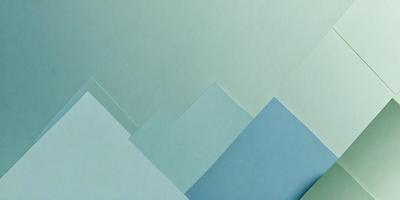The primary subject of the image is a blue paper with a mountain pattern on it. The setting is a white background, and the visual style appears to be a digital art or illustration. The dominant colors are blue and white, creating a calm and serene atmosphere.