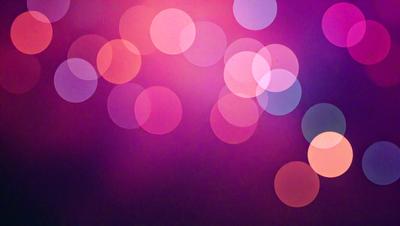 The primary subject of the image is a purple background with a pattern of pink and white circles. The setting is a dark background, which contrasts with the bright colors of the circles. The visual style appears to be a digital art or illustration, as the circles are arranged in a visually appealing manner. The colors and mood of the image are vibrant and lively, with the pink and white circles creating a sense of energy and movement.