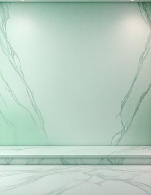 The primary subject of the image is a white marble wall with a patterned design. The setting is a room with a white bench placed in front of the wall. The visual style is a photo, and the colors and mood are predominantly white, giving the scene a clean and elegant appearance.
