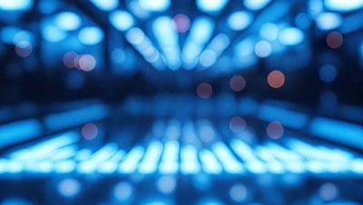 The primary subject of the image is a blue light, which is illuminating a large, open space. The setting appears to be a large room with a blue ceiling, and the visual style is a combination of a photo and digital art. The dominant colors in the image are blue and white, creating a calm and serene atmosphere.