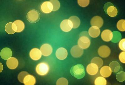 The primary subject of the image is a brightly lit green background with a pattern of yellow lights. The setting appears to be a dark room, and the visual style is a combination of a photo and digital art. The colors and mood of the image are vibrant and lively, with the green background and yellow lights creating a sense of energy and excitement.