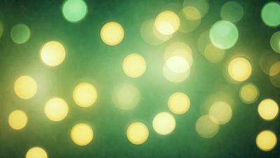 The primary subject of the image is a green background with a pattern of yellow lights. The setting appears to be a dark room, and the visual style is a combination of a photo and digital art. The dominant colors are green and yellow, creating a warm and inviting atmosphere.