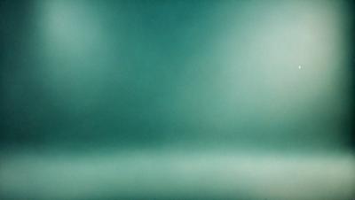 The primary subject of the image is a large, dark green wall. The setting is a room with a green background, and the visual style appears to be a photo. The dominant colors in the image are green, and the overall atmosphere is calm and serene.