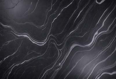 The primary subject of the image is a marble countertop with a black and white pattern. The setting is a kitchen, and the visual style is a close-up of the marble countertop. The colors and mood of the image are predominantly black and white, giving it a classic and elegant appearance.