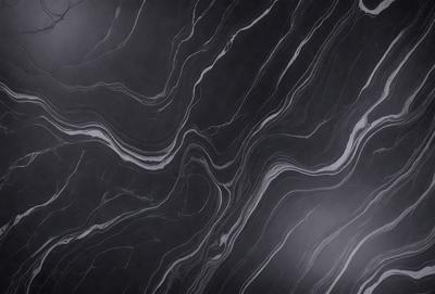 The primary subject of the image is a marble countertop with a black and white pattern. The setting is a kitchen, and the visual style is a close-up of the marble countertop. The colors and mood of the image are predominantly black and white, giving it a classic and elegant appearance.