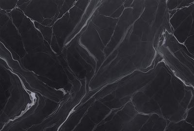 The image features a black marble countertop with a pattern of swirls and curves. The countertop appears to be a part of a kitchen or bathroom design, adding a touch of elegance and sophistication to the space. The marble countertop is the primary subject of the image, showcasing its unique and visually appealing pattern.