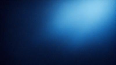 The primary subject of the image is a blue background with a bright light shining through it. The setting appears to be a dark room, and the visual style is a combination of a photo and a digital art. The colors and mood of the image are predominantly blue, creating a calm and serene atmosphere.