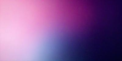 The primary subject of the image is a large, pink wall. The setting is a room with a purple background. The visual style is a close-up of the wall, which gives a sense of depth and texture. The dominant colors are pink and purple, creating a warm and inviting atmosphere.