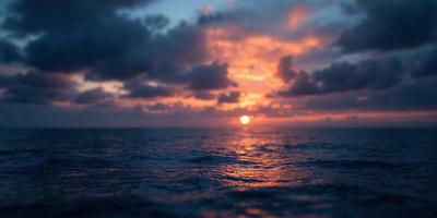 The primary subject of the image is the ocean, with a beautiful sunset in the background. The setting is a vast body of water, and the visual style is a combination of photo and digital art. The colors and mood of the image are warm and serene, with the sunset casting a golden glow over the water.