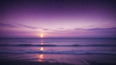 The primary subject of the image is the sunset over the ocean. The sun is setting behind the ocean, casting a warm glow on the water. The setting/background features the vast expanse of the ocean, with waves rolling in. The visual style of the image is a photo, capturing the beauty of the sunset and the serene atmosphere of the ocean. The colors and mood of the image are dominated by the warm hues of the sunset and the calming presence of the ocean.