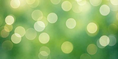 The primary subject of the image is a green field with a bright, luminous background. The setting appears to be a natural environment, possibly a park or a field of grass. The visual style of the image is a combination of a photo and digital art, creating a unique and vibrant atmosphere. The dominant colors in the image are green and yellow, which contribute to a sense of freshness and energy.