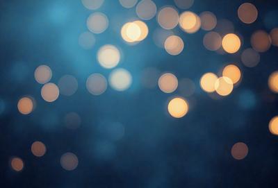 The primary subject of the image is a brightly lit, blue background with a pattern of white lights. The setting appears to be a dark room, and the visual style is a combination of a photo and digital art. The dominant colors are blue and white, creating a calm and serene atmosphere.