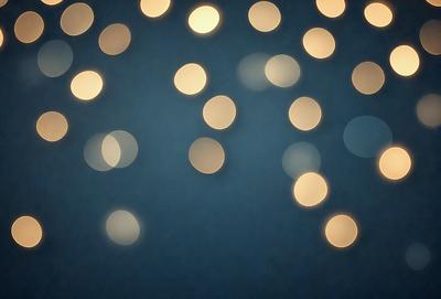 The primary subject of the image is a blue background with a pattern of yellow lights. The setting appears to be a nighttime scene, possibly a cityscape or a festive event. The visual style is a combination of a photo and digital art, creating a unique and eye-catching effect. The dominant colors are blue and yellow, with the blue background and the yellow lights creating a vibrant and lively atmosphere.