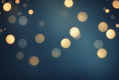 The primary subject of the image is a blue background with a pattern of white lights. The setting appears to be a nighttime scene, possibly a cityscape or a dark room with a light source. The visual style of the image is a combination of a photo and digital art, creating a unique and captivating atmosphere. The dominant colors are blue and white, with the white lights creating a sense of depth and contrast against the dark blue background.