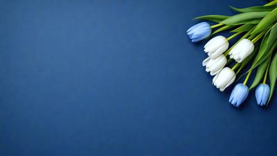 The primary subject of the image is a bouquet of white flowers, which are placed against a blue background. The visual style of the image is a photo, capturing the beauty of the flowers in their natural setting. The colors and mood of the image are predominantly blue, creating a calm and serene atmosphere.